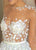 See Through O-Neck Wedding Dresses With Appliques Tulle Long Sleeves Sweep Train Bridal Gown