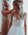 Sexy Spaghetti Straps Wedding Dresses Tulle Ruffles Skirt Low Back A-line Bridal Gowns