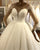 2020 Sexy Sheer Long Sleeve Wedding Gowns with Pearls Beaded Tulle Ball Gown Wedding Dress