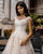 Delicate Lace Wedding Dresses Boat Neckline Cap Sleeve Sexy Sheer Back A-line Silhouette Tulle Skirt Bridal Gowns