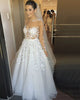 See Through O-Neck Wedding Dresses With Appliques Tulle Long Sleeves Sweep Train Bridal Gown 2020