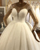 2020 Sexy Sheer Long Sleeve Wedding Gowns with Pearls Beaded Tulle Ball Gown Wedding Dress