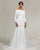 Duchess Inspired Wedding Dress Featuring a Six Panel, Sateen Sculpted A-Line Silhouette and Modern Sabrina Neckline with an Extended Chapel Train