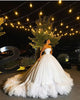 Tulle Ball Gown Wedding Dresses Ruffle Skirts Strapless Bridal Wedding Gowns Long Train